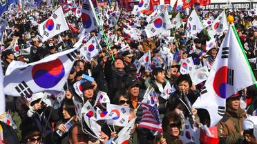 Des partisans de l'ancienne présidente sud-coréenne Park Geun-Hye rassemblés à Séoul, le 11 mars 2017 [JUNG Yeon-Je / AFP]