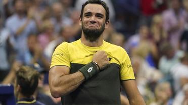 Matteo Berrettini célèbre sa victoire contre Gaël Monfils en quart de finale de l'US Open, le 4 septembre à New York. [Kena Betancur / AFP]