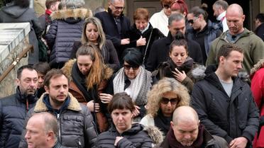 Les fidèles quittent  émus l'église de Trèbes, dimanche 25 mars 2018  deux jours après les attaques terroristes [ERIC CABANIS / AFP]