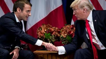 Emmanuel Macron et Donald Trump, le 18 septembre 2017 aux Nations Unies à New York. Le président français retrouve lundi aux Etats-Unis son homologue américain qui le reçoit avec les honneurs d'une "visite d'Etat". [Brendan Smialowski / AFP/Archives]