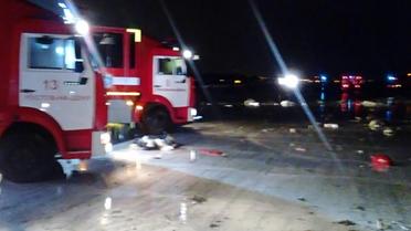 Photo fournie par les autorités russes montrant des camions de secours à l'aéroport de Rostov-sur-le-Don en Russie, le 19 mars 206 [Russia Emergency Ministry / RUSSIAN EMERGENCY MINISTRY HO/AFP]