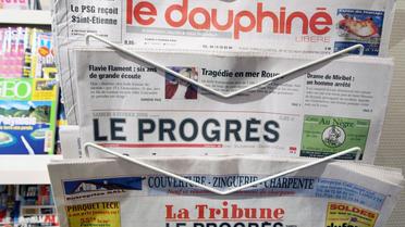 Vue prise le 04 février 2006 à Lyon, montrant trois quotidiens de la région Rhône-Alpes, parmi lesquels Le Progrès  [Philippe Merle / AFP/Archives]