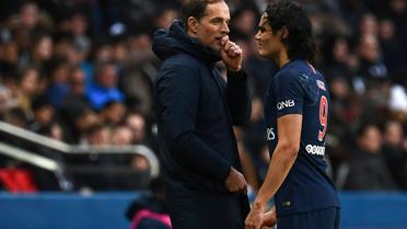 L'entraîneur Thomas Tuchel (g) et Edinson Cavani lors du match face à Bordeaux le 9 février 2019 [ANNE-CHRISTINE POUJOULAT / AFP]