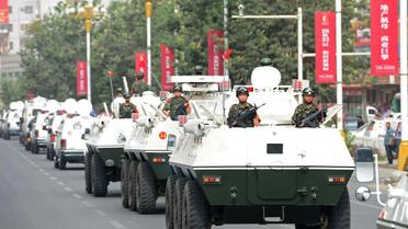 Le 6 juin 2014, un convoi militaire de forces de sécurité chinoises à Hetian, dans la région musulmane du Xinjiang dans le nord-ouest de la Chine [AFP / AFP/Archives]