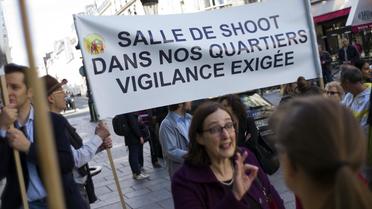 Des personne protestent contre l'installation d'une "salle de shoot" près de la gare du Nord (Xe arrondissement), le 1er juin 2013 à Paris [Fred Dufour / AFP/Archives]