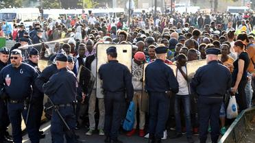 La précédente opération d'évacuation de campements de migrants porte de La Chapelle, le 7 juillet 2017 [Eric FEFERBERG / AFP/Archives]