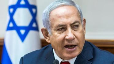 Le Premier ministre israélien Benjamin Netanyahu lors d'une réunion hebdomadaire de son gouvernement, le 12 août 2018 à Jérusalem [JIM HOLLANDER / POOL/AFP/Archives]