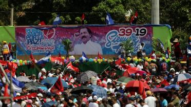 Des soutiens du président Daniel Ortega participe aux commémorations de la révolution sandiniste à Managua, au Nicaragua, le 19 juillet 2018 [INTI OCON / AFP]