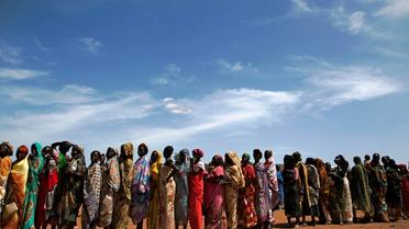 Des femmes et enfants, fuyant les combats dans leurs villages, arrivent au camp de Wau pour personnes déplacées, le 11 mai 2016 au Soudan du Sud [ALBERT GONZALEZ FARRAN / AFP/Archives]