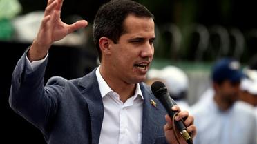 Le chef de file de l'opposition vénézuélienne Juan Guaido, reconnu président par intérim par une cinquantaine de pays dont les Etats-Unis, devant ses partisans à Caracas le 27 avril 2019. [Federico Parra                       / AFP]