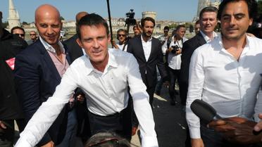 Le Premier ministre Manuel Valls à son arrivée le 29 août 2015 à l'université d'été du PS à La Rochelle [MEHDI FEDOUACH / AFP]