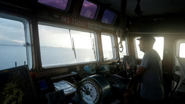 L'Espagnole Marc Reig, capitaine du navire de l'ONG Proactiva Open Arms à l'approche du port de Palma de Majorque le 21 juillet 2018. [Pau BARRENA / AFP]