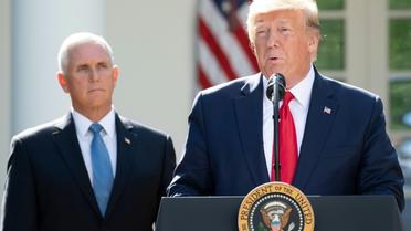 Le président américain Donald Trump, aux côtés de son vice-président Mike Pence, le 29 août 2019 à la Maison Blanche  [SAUL LOEB / AFP]