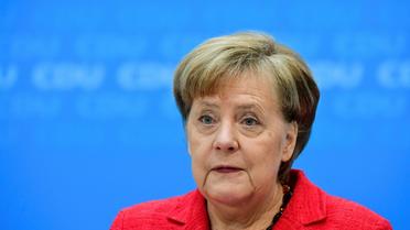 La chancelière allemande Angela Merkel au siège de son parti chrétien-démocrate (CDU) à Berlin, le 5 mars 2018 [John MACDOUGALL / AFP]
