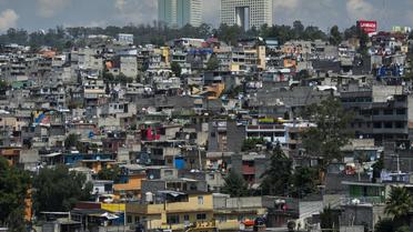 Des bidonvilles construits près de quartiers riches à Mexico le 24 juillet 2012 [Omar Torres / AFP/Archives]