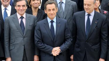 Nicolas Sarkozy et Alain Juppé (d) candidats favoris pour prendre la tête de l'UMP [Eric Feferberg / AFP/Archives]