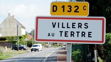 L'entrée du village de Villers-au-Tertre, où les corps de huit bébés furent découverts le 29 juillet 2010 [Denis Charlet / AFP/Archives]