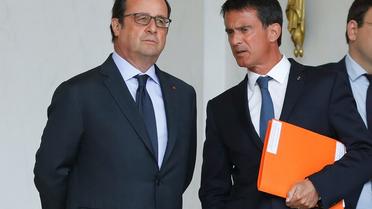 Le Président Francois Hollande et le Premier ministre Manuel Valls à l'Elysée le 11 août 2016 [PATRICK KOVARIK / AFP/Archives]