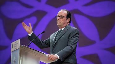 François Hollande lors d'un hommage à François Mitterrand le 26 octobre 2016 au musée du Louvre à Paris [IAN LANGSDON / POOL/AFP/Archives]