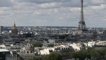 Paris comptera dès cet automne douze "zones touristiques internationales" (ZTI) où les commerces pourront ouvrir le dimanche et tous les soirs de la semaine jusqu’à minuit [Patrick Kovarik / AFP/Archives]