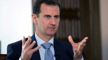 Photo fournie le 31 mars 2016 par l'agence de presse syrienne Sana du président Bachar al-Assad lors d'un entretien à l'agence de presse officielle russe Ria-Novosti à Damas [Handout / SANA/AFP]