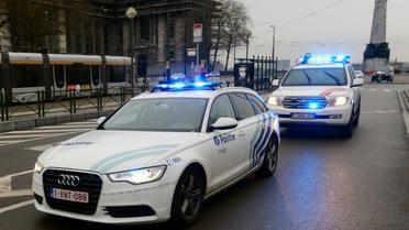 Des voitures de police à Bruxelles le 31 mars 2016 [JOHN THYS / AFP/Archives]