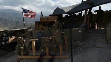 Des soldats américains de l'Otan positionnés à un poste de contrôle dans la province afghane de Nangarhar, le 7 juillet 2018 [WAKIL KOHSAR / AFP/Archives]
