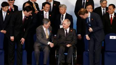 Photo de famille des participants au G20 le 27 février 2016 à Shangaï [ROLEX DELA PENA / POOL/AFP]