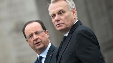 Francois Hollande (g) et Jean-Marc Ayrault, le 8 mai 2013 à Paris [Bertrand Langlois / POOL/AFP/Archives]