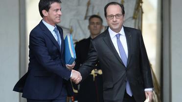 Manuel Valls et François Hollande à l'issue du conseil des ministres le 2 novembre 2016 à l'Elysée à Paris [STEPHANE DE SAKUTIN / AFP/Archives]