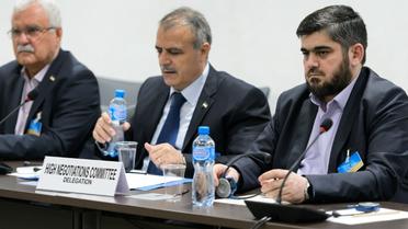 Des membres de l'opposition syrienne du HCN, George Sabra,  Asaad al-Zoabi et Mohammad Allouche le 15 avril 2016 à Genève [FABRICE COFFRINI / POOL/AFP]