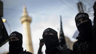 Des membres d'une brigade islamiste en Syrie le 25 février 2013 à Deir Ezzor, dans l'est [Zac Baillie / AFP]