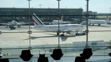 Un Airnbus A318 d'Air France à l'aéroport parisien de Roissy Charles-de-Gaulle, le 12 mai 2020 [ERIC PIERMONT / AFP]
