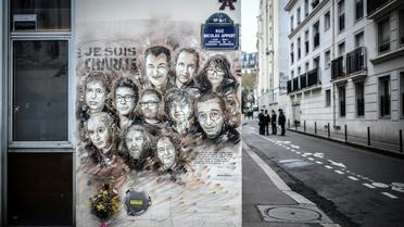 Une fresque représentant les victimes de l'attentat contre Charlie Hebdo photographiée le 7 janvier 2019 sur un mur des anciens locaux du journal à Paris [STEPHANE DE SAKUTIN / AFP/Archives]