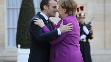 Le président Emmanuel Macron accueille la Chancelière allemande Angela Merkel, le 16 mars 2018 à l'Elysée, à Paris [LUDOVIC MARIN / AFP]
