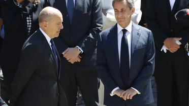 Alain Juppé et Nicolas Sarkozy le 7 juillet 2016 à Paris   [PATRICK KOVARIK / AFP/Archives]
