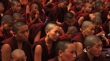 Des moines et nonnes tibétains à Siliguri, en Inde, le 28 mars 2013 [Diptendu Dutta / AFP/Archives]