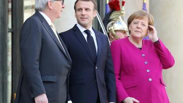 Le président de la Commission européenne Jean-Claude Juncker, le président français Emmanuel Macron et la chancelière allemande Angela Merkel à Paris le 26 mars 2019 [ludovic MARIN / AFP/Archives]
