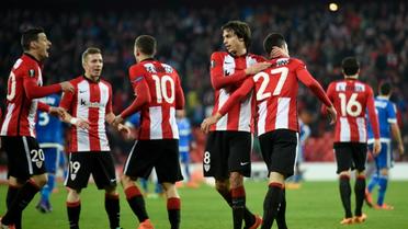 Les joueurs de l'Athletic Bilbao célèbrent le but de Sabin Merino en 16e de finale retour d'Europa League contre l'Olympique de Marseille, le 25 février 2016 à Bilbao [ANDER GILLENEA / AFP]