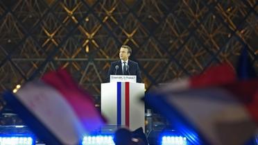 Emmanuel Macron, tout juste élu président, prononce un discours devant la Pyramide du Louvre, le 7 mai 2017 à Paris [Eric FEFERBERG / AFP/Archives]