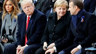 Le président américain Donald Trump, la chancelière allemande Angela Merkel et le président français Emmanuel Macron à Paris le 11 novembre 2018 [Francois Mori / POOL/AFP/Archives]
