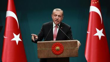 Le président turc Erdogan lors d'une conférence de presse au palais présidentiel à Ankara, le 20 juillet 2016 [ADEM ALTAN / AFP/Archives]