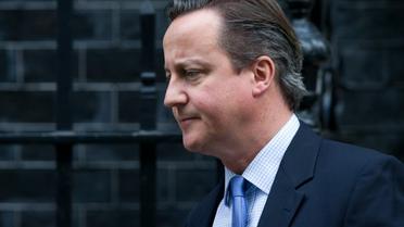 Le Premier ministre britannique David Cameron quitte le 10 Downing Street à Londres pour rejoindre le Parlement qui doit se prononcer sur d'éventuelles frappes en Syrie, le 2 décembre 2015  [JUSTIN TALLIS / AFP]