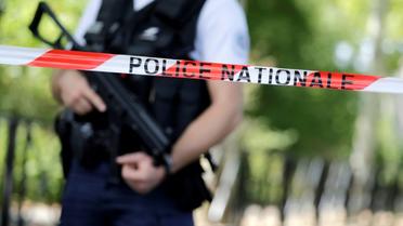 Un cordon de police à Trappes, au sud-ouest de Paris, le 23 août 2018 [Thomas SAMSON / AFP]