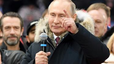 Le président russe Vladimir Poutine, candidat à la présidentielle, lors d'un meeting de campagne, le 3 mars 2018 à Moscou [Kirill KUDRYAVTSEV / AFP/Archives]