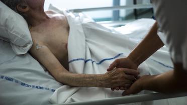 Patient dans une unité de soins palliatifs [Fred Dufour / AFP/Archives]