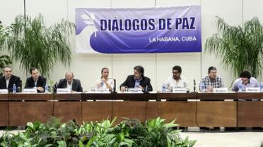 Des membres du gouvernement colombien et des Farc lors d'une conférence de presse à La Havane, le 12 août 2016 [ADALBERTO ROQUE / AFP/Archives]
