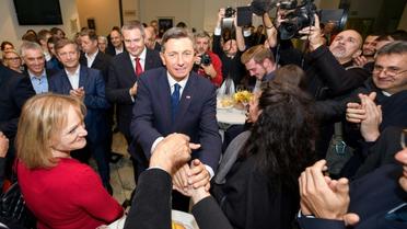 Le chef de l'Etat slovène sortant, Borut Pahor, célèbre sa réélection, le 12 novembre 2017 à Ljubjana  [Jure Makovec / AFP]
