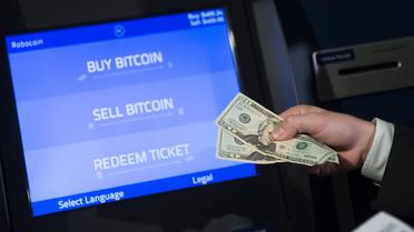 Un distributeur de bitcoin à Washington DC, le 8 avril 2014 [Saul Loeb / AFP/Archives]