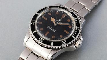 La montre Rolex Submariner portée par Roger Moore dans le film de James Bond "Live and Let Die" vendue aux enchères à Genève par la maison Phillips le 9 novembre 2015 [ / Maison d'enchères PHillips/AFP]